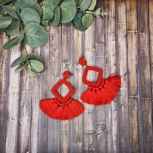 Red tassel and beaded earrings